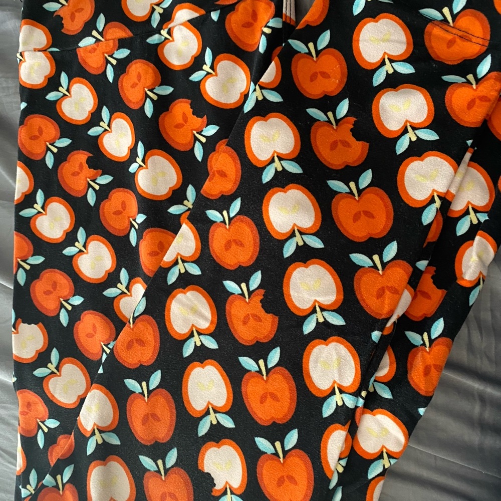 Apple print leggings.